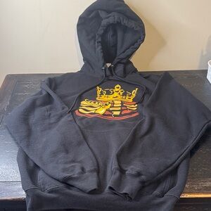 Black Football Pancake Hoodie with Yellow and Brown Graphic